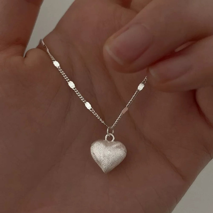 silver necklace with collarbone length and clasp