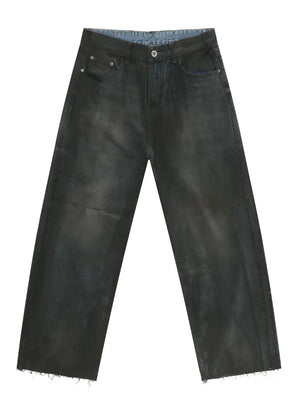 Washed denim wide-leg trousers in dark with a raw hem.