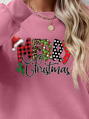 Festive graphic sweatshirt in Blush Pink with Merry Christmas text, Santa hat, and holly detail.