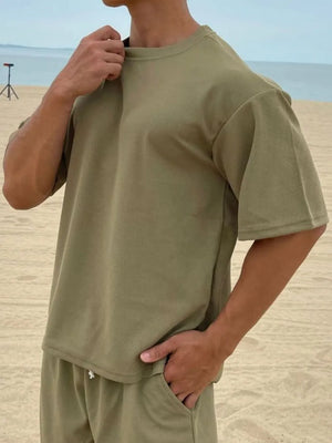 Oversized cotton tee in Matcha Green with drop shoulder and crew neck.