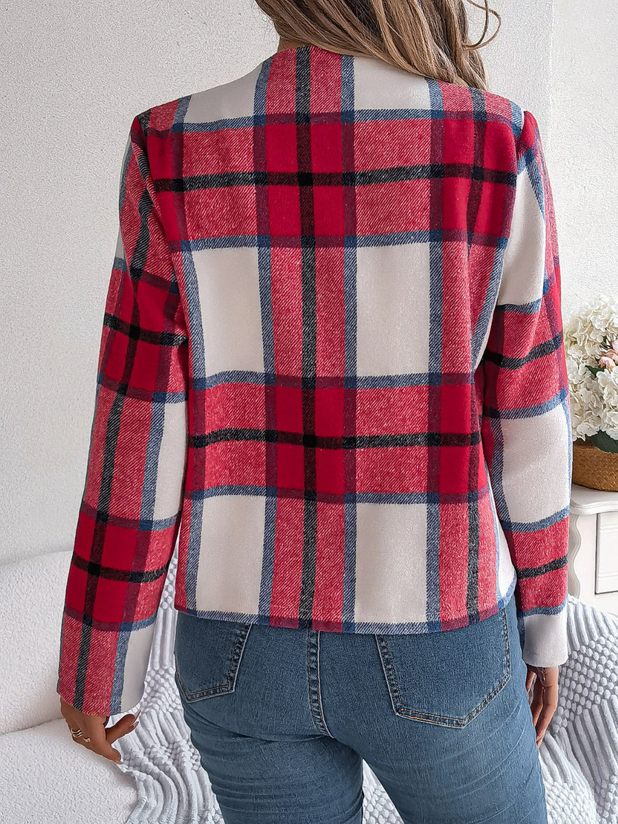 Collarless plaid cropped jacket in red, white, and blue plaid.