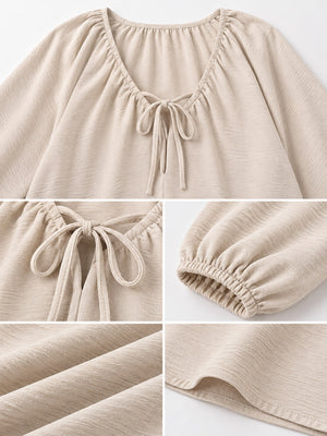 beige relaxed blouse with v-neck