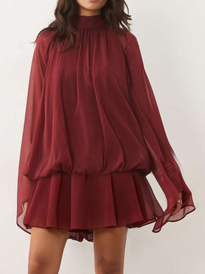 mini dress in Purple with mock neck and bell sleeve