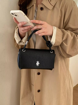 Turn-lock Leather Crossbody Bag in black with structured