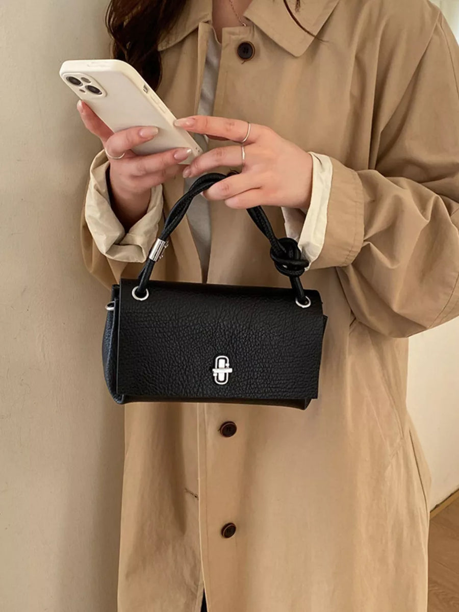 Turn-lock Leather Crossbody Bag in black with structured