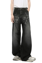 Dark wash wide leg denim jeans with sculpted front panel detailing and a faded effect.