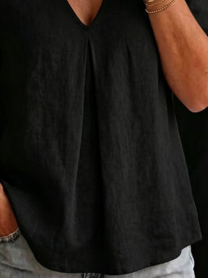 Black linen blend v-neck top with front pleats and short sleeves