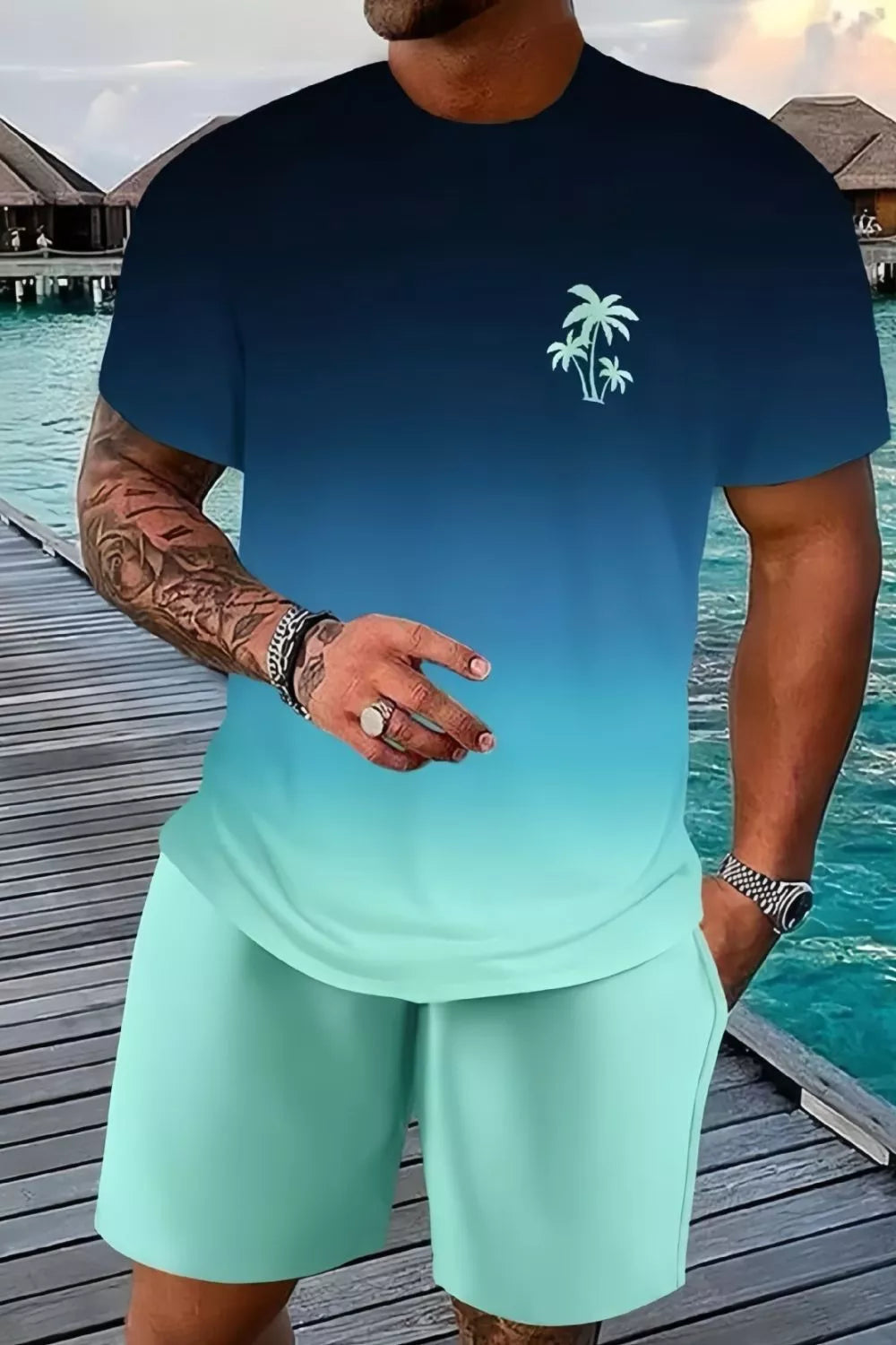 Men's casual set with ombre blue t-shirt and mint shorts, featuring a palm tree graphic.