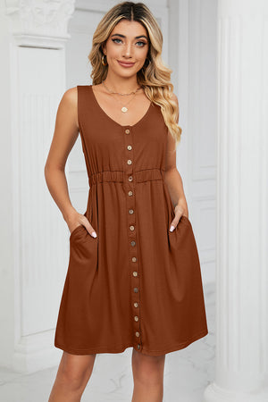 Button-down a-line summer dress in caramel with V-neck, sleeveless, elastic waist, and pockets.