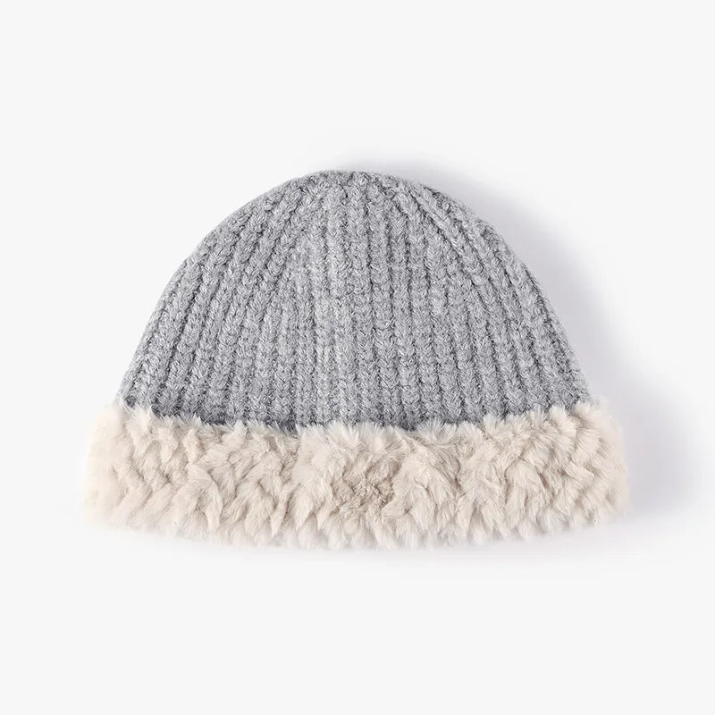 Light gray ribbed knit beanie with plush faux fur trim