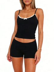 Black lace-trimmed cami and shorts set with a bow detail