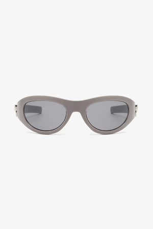 Gray sporty shield sunglasses with dark lenses and a bow accent detail.