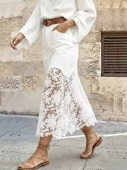 White midi skirt featuring lace and floral