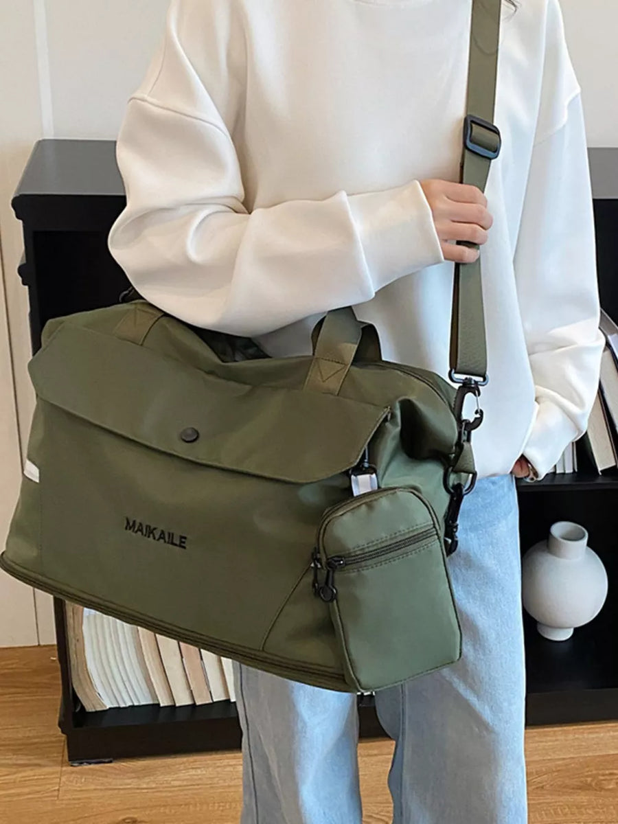 Olive green duffel bag with MAIKAILE logo and detachable pouch, worn crossbody.