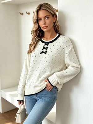 pullover sweater in black with polka dot and bow