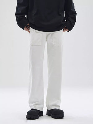 Relaxed fit white cotton chinos with patch pockets for men.