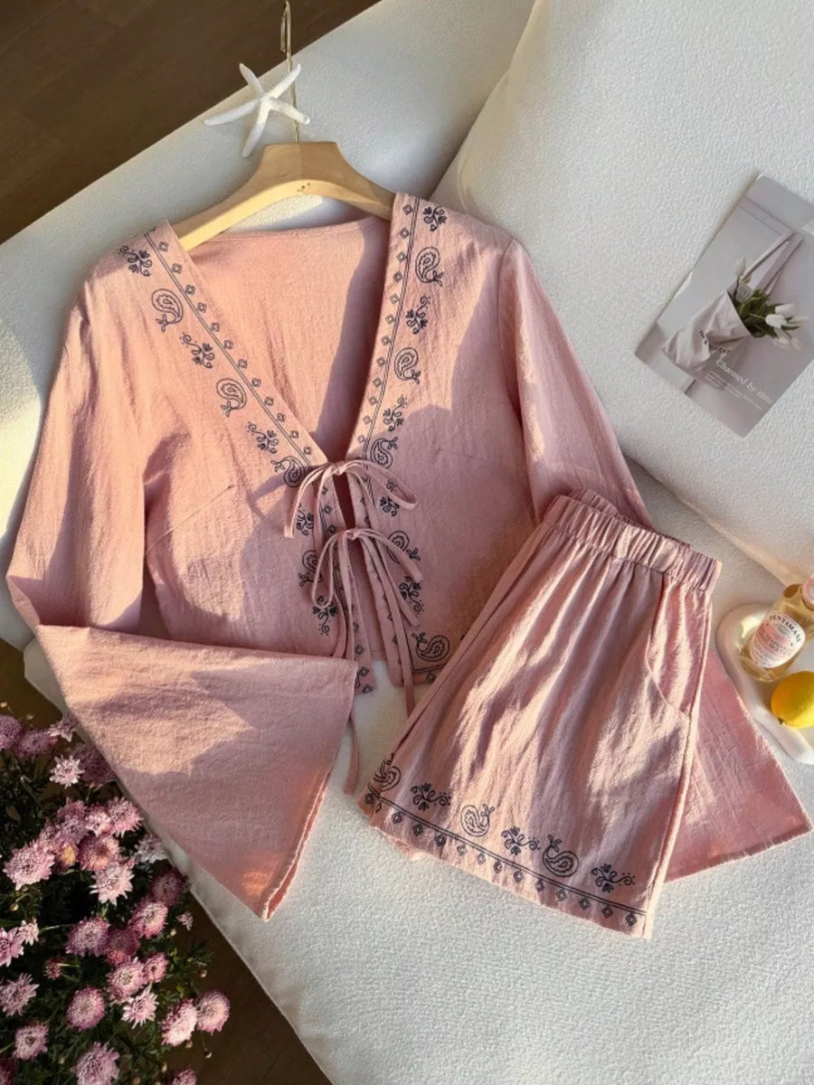 Pink embroidered tie-front top & shorts set with paisley detail.