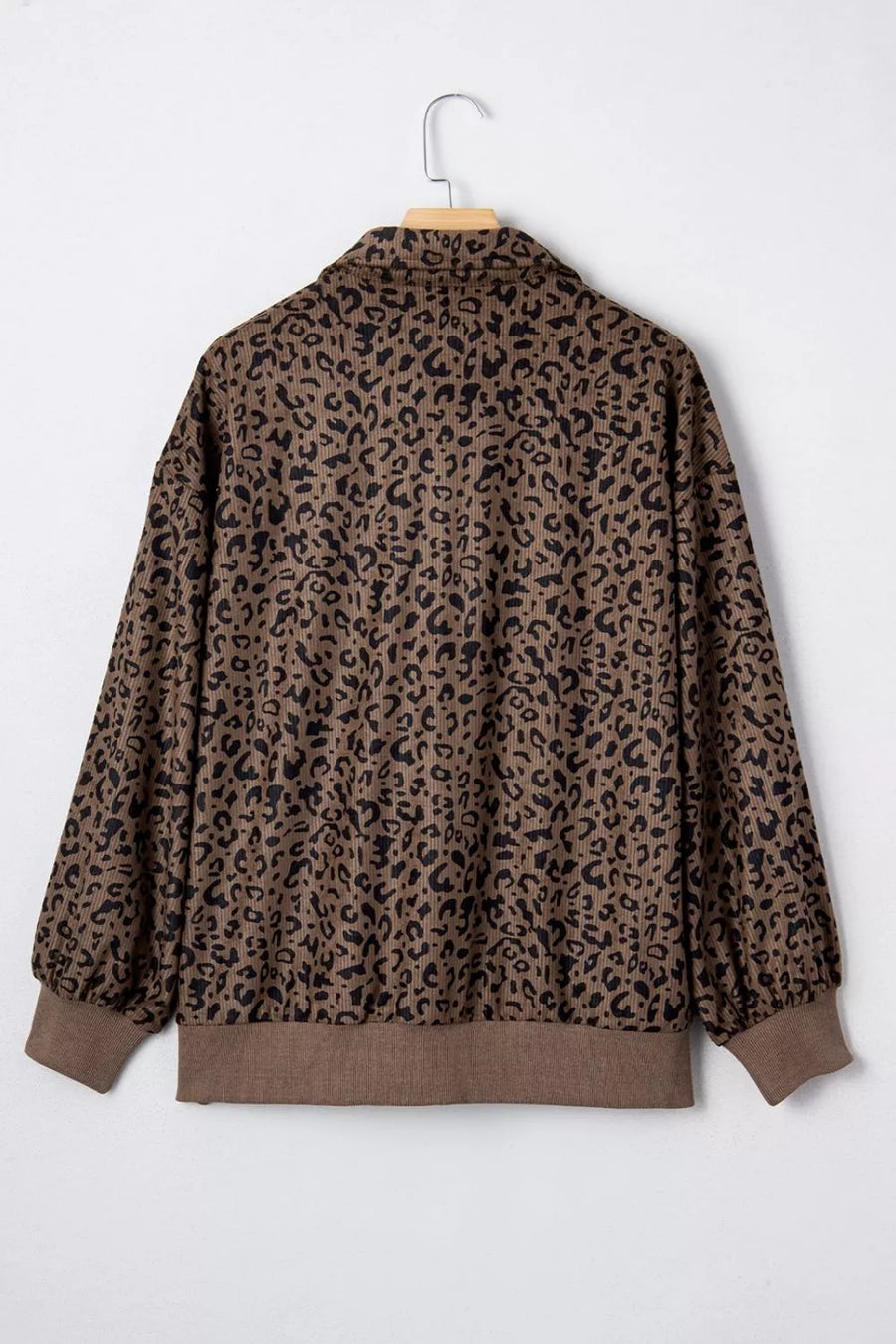 black sweatshirt with quarter-zip and leopard