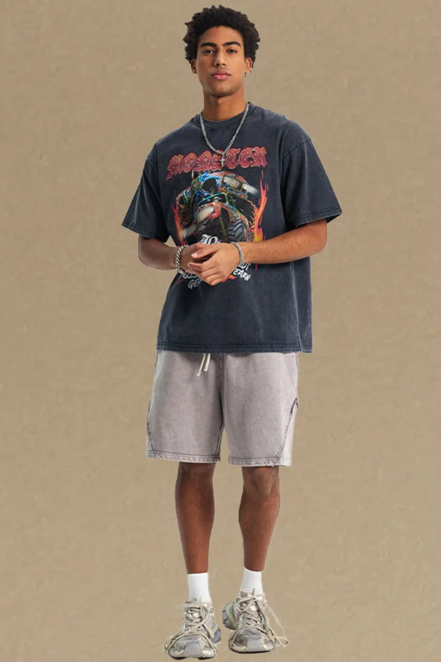 Black vintage monster truck graphic tee with distressed details and a crew neck.