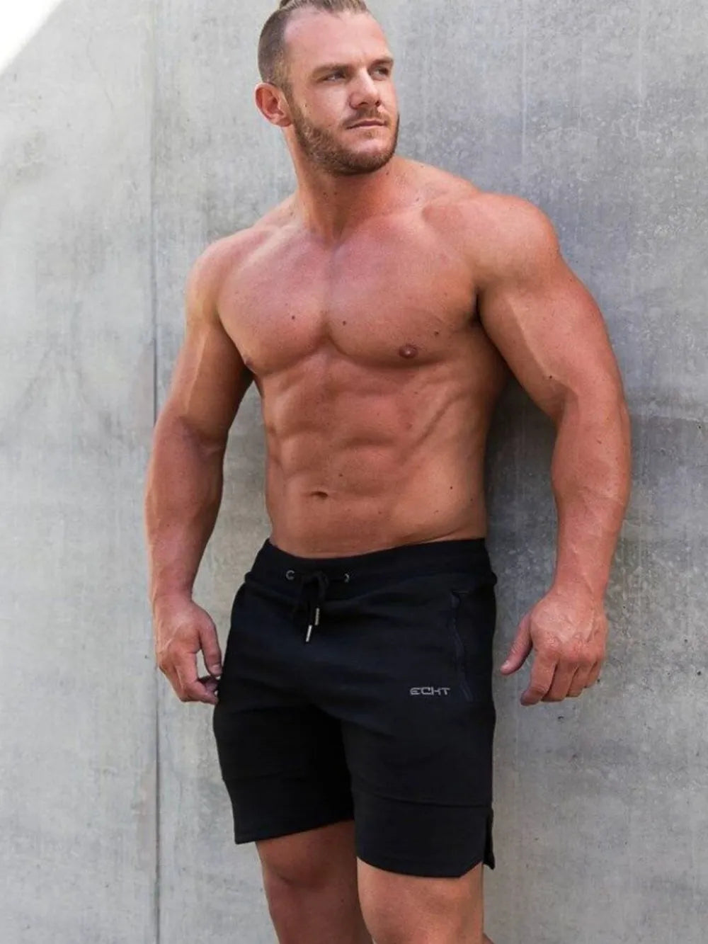Black training shorts with drawstring and logo detail