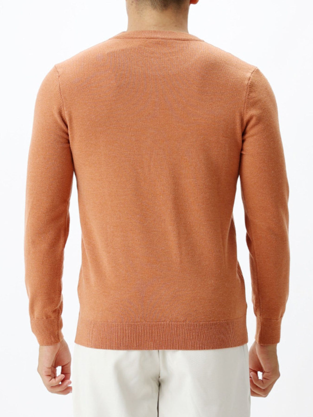 95%polyester,5%spandex Care instructions: Machine wash cold crewneck sweater in Apricot with regular silhouette