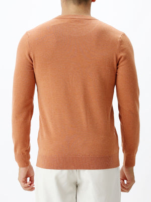 95%polyester,5%spandex Care instructions: Machine wash cold crewneck sweater in Apricot with regular silhouette