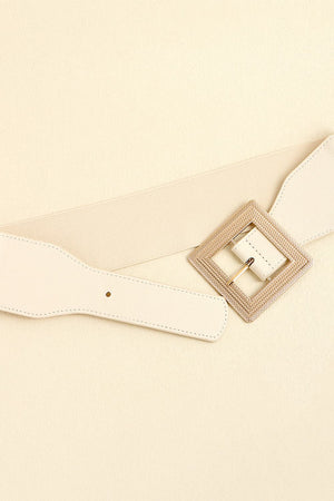 Ivory elasticated waist belt with textured square buckle and faux leather end.