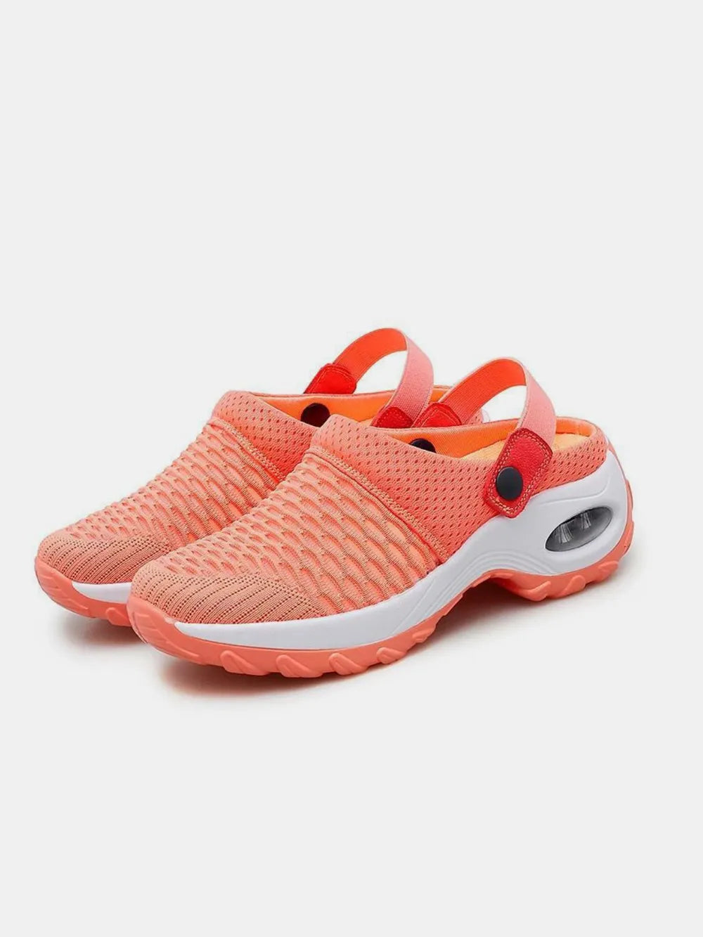 Coral mesh slingback sandals with air cushion sole and adjustable straps.