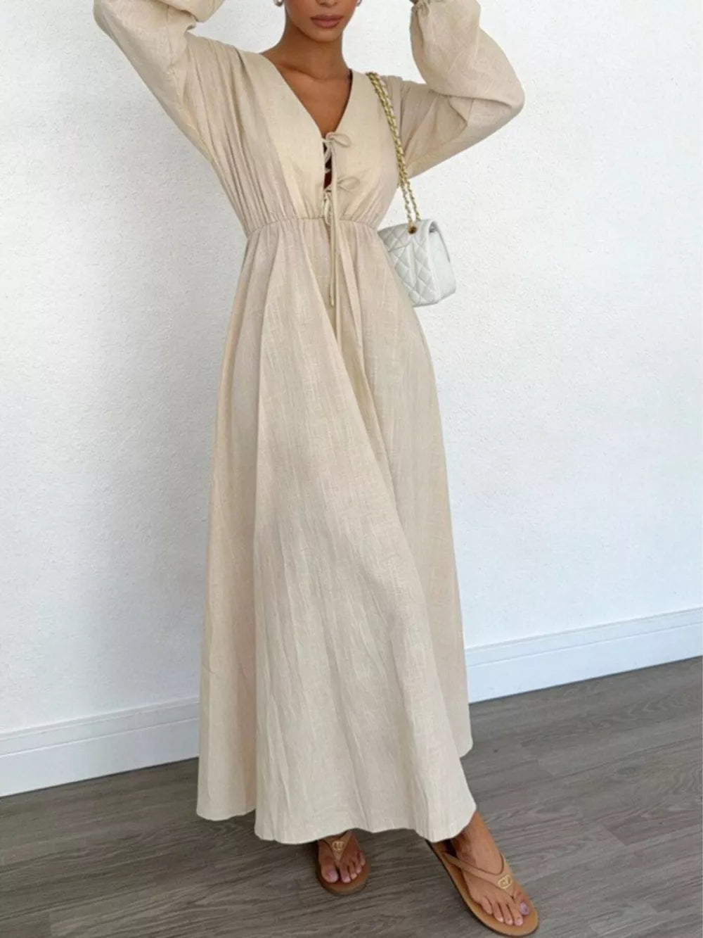 maxi dress in beige featuring tied front and A-line fit