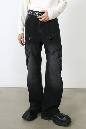 Faded black denim utility cargo pants with zip pockets and large flap pockets.