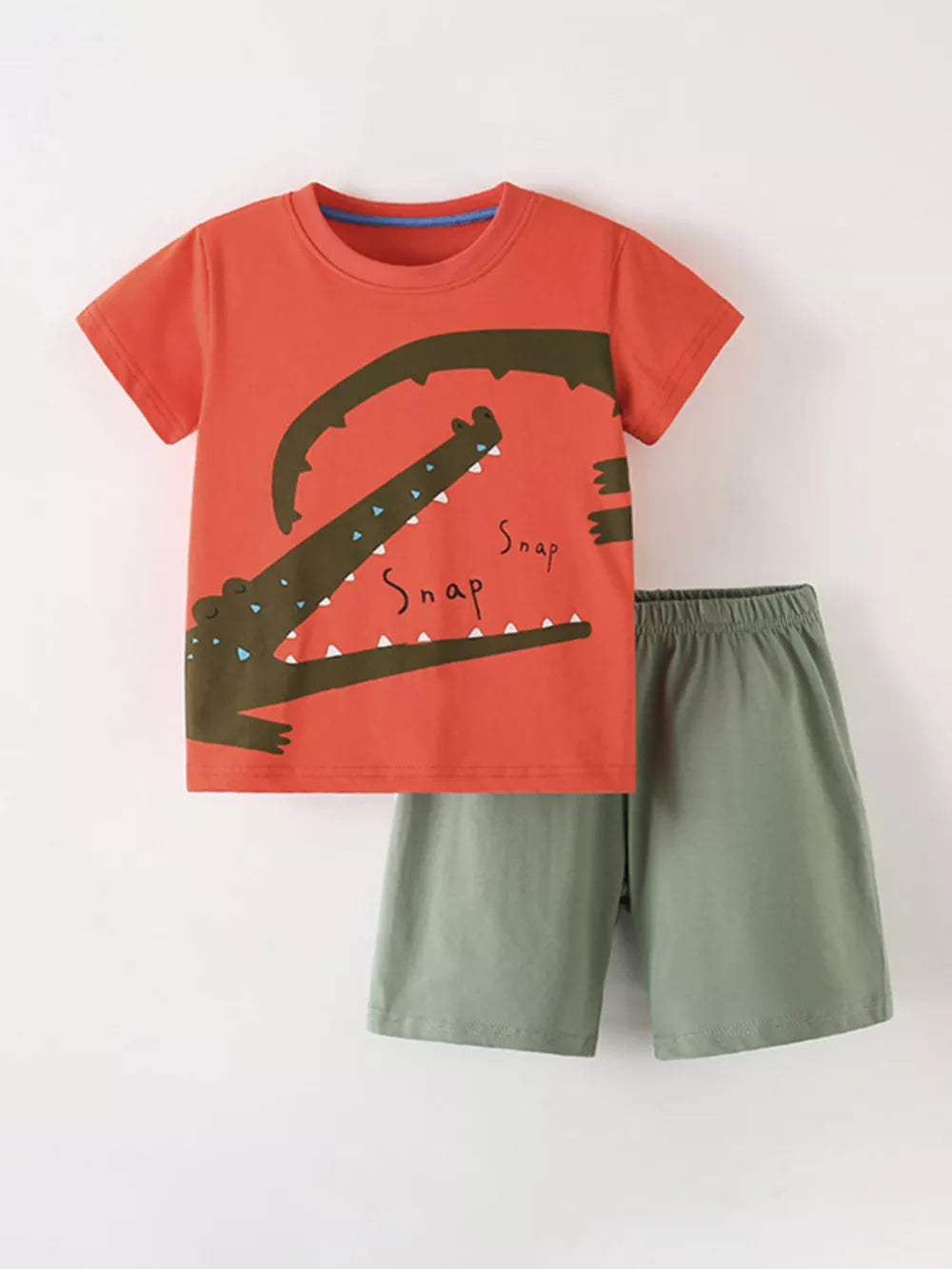 Coral cotton toddler boys' set with playful crocodile graphic tee and green shorts.