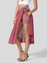 Flowy midi skirt with shorts liner in Rose Red, featuring a drawstring waist and pockets.