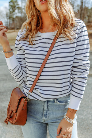 Nautical stripe crewneck sweatshirt in white with navy stripes, crew neck, long sleeves, and ribbed cuffs.