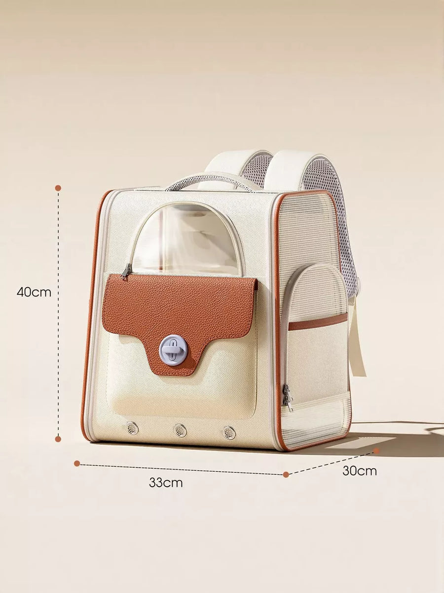 Chic two-tone pet carrier backpack in cream and brown with clear dome and mesh sides.