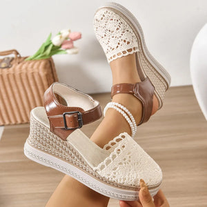 Beige crochet and leather wedge sandals with ankle strap and woven wedge detail.