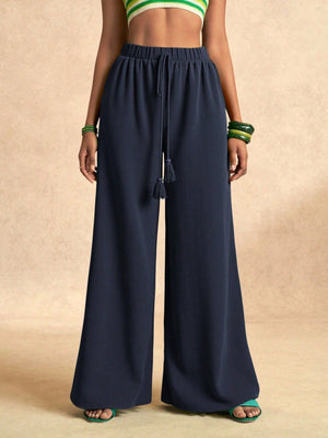 Relaxed-Fit High-Waisted Wide-Leg Pants in White with drawstring