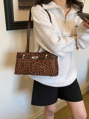 shoulder bag in brown with leopard-print and decorative lock