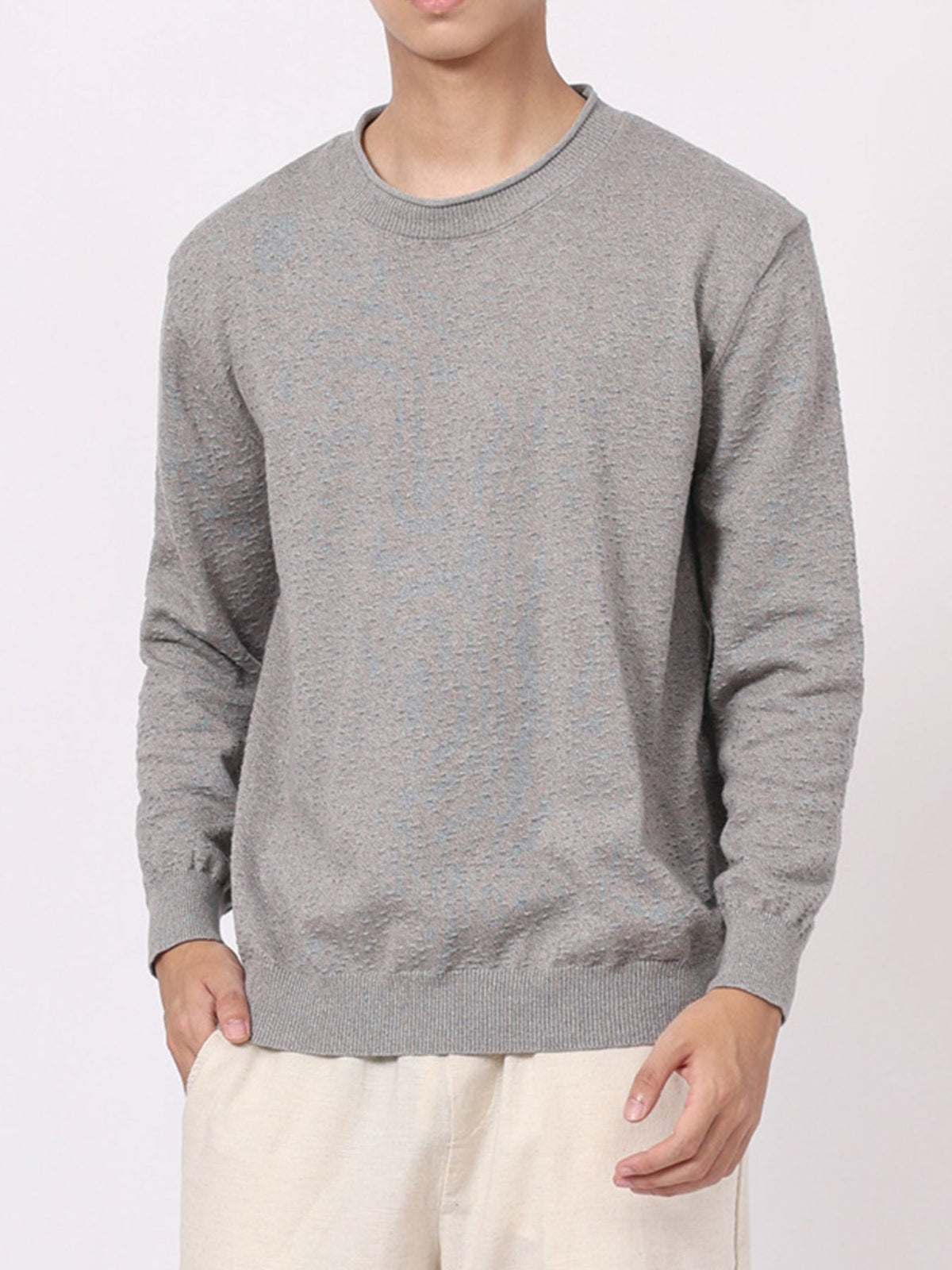 light gray crewneck sweater with textured and crew neck