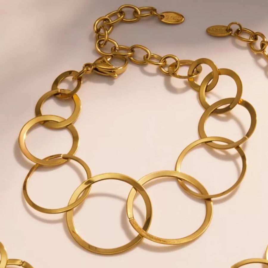 18K Gold-Plated, Stainless Steel Care instructions: Avoid wearing during exercis bracelet in gold with chain bracelet