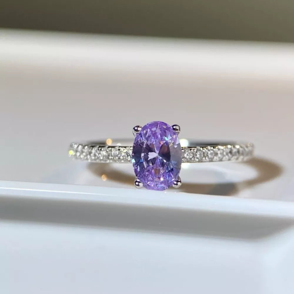 ring in lavender featuring oval cut stone and band fit