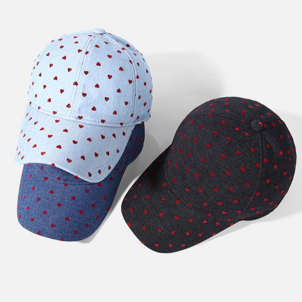 Heart-patterned baseball cap in sky blue and black blended fabric