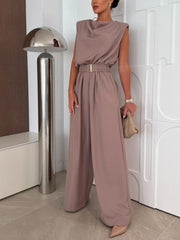 Mocha cowl neck wide-leg jumpsuit with gold belt detail and padded shoulders