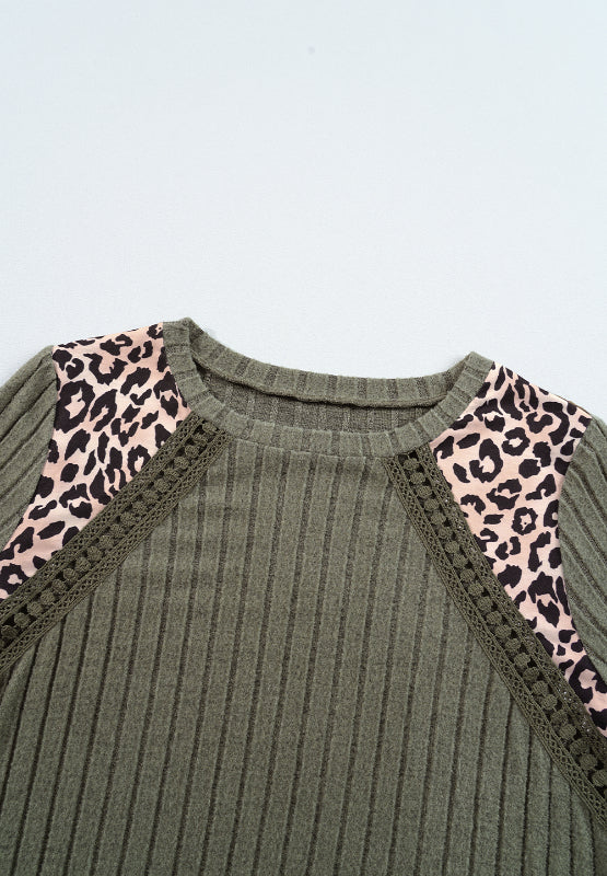 Army green ribbed knit top with leopard print shoulder panels and lace trim.