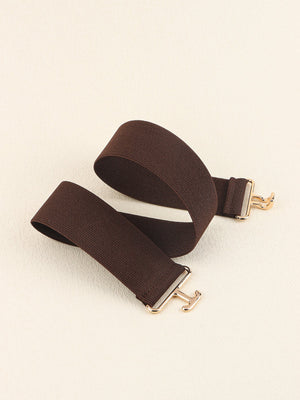 Chocolate elastic belt with sculpted gold buckle detail