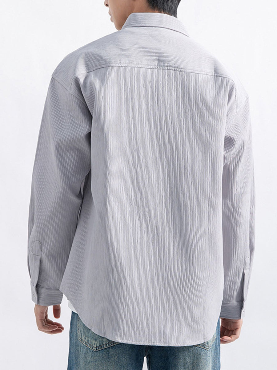 Black relaxed button-down shirt with collared