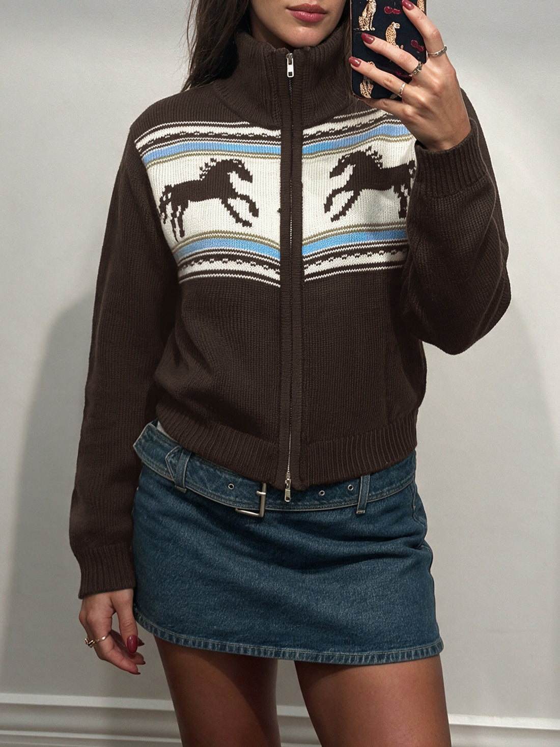 dark brown zip-up sweater with horse motif and mock neck