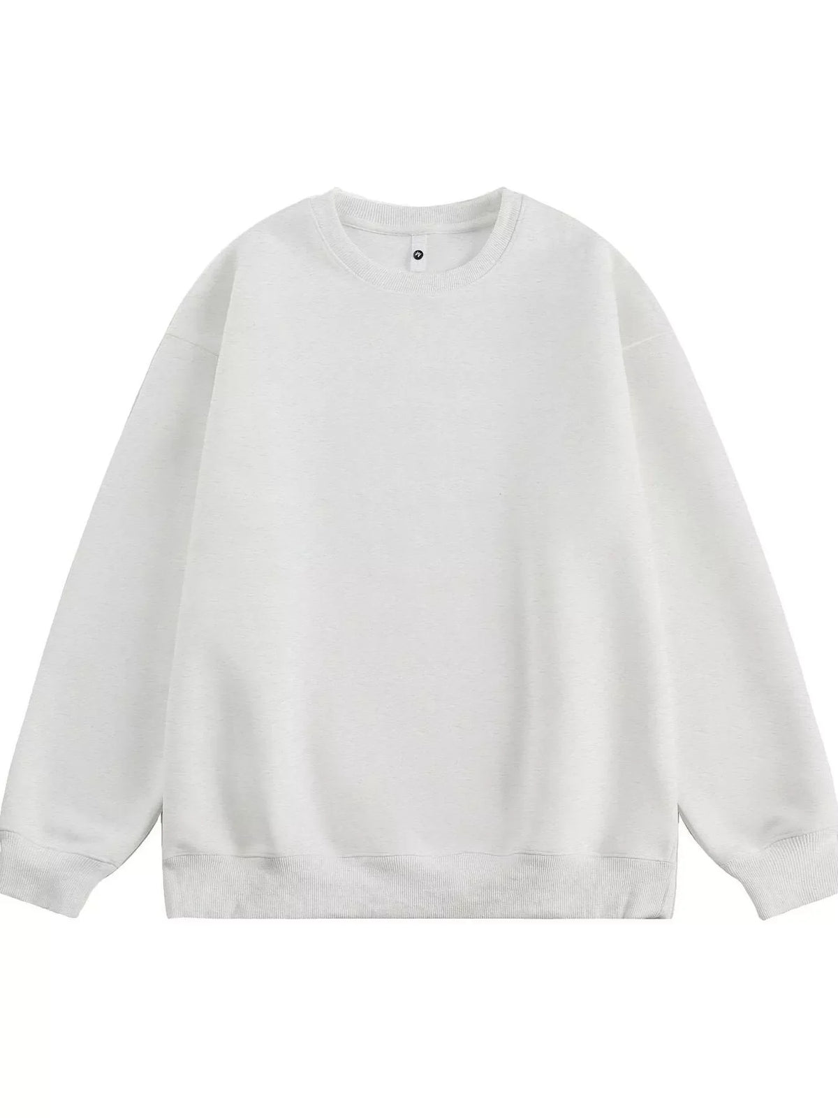 Oversized crew-neck sweatshirt in white, featuring a relaxed fit and ribbed cuffs and hem.