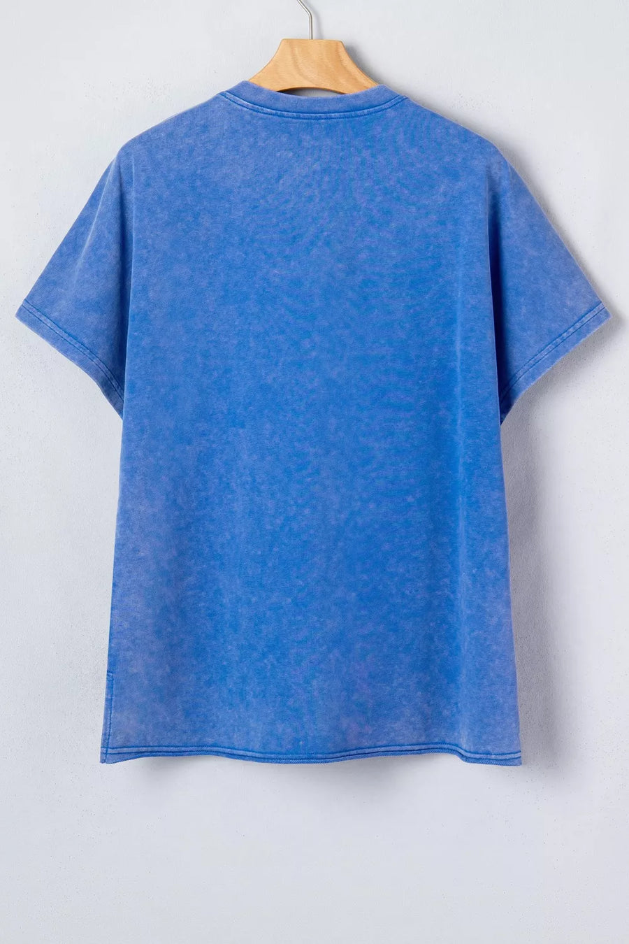 Blue mineral wash cotton t-shirt with short sleeves and notched neckline.