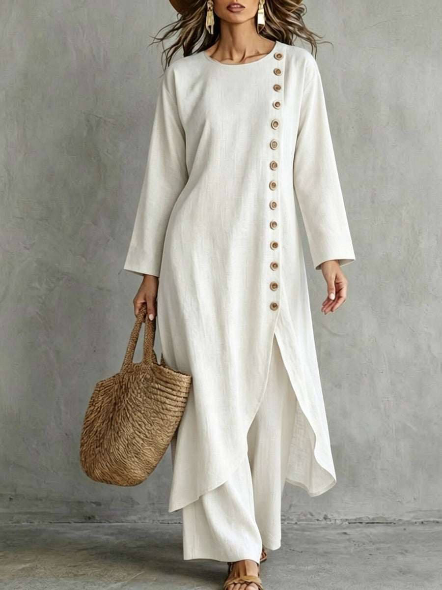 top and pants set in ivory featuring buttoned and relaxed fit