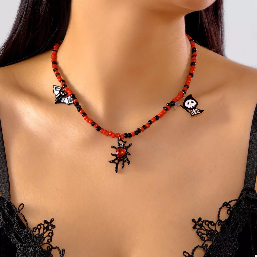 Resin, Zinc alloy, Rice beads Care instructions: Avoid wearing during exercise, necklace in Black with straight silhouette